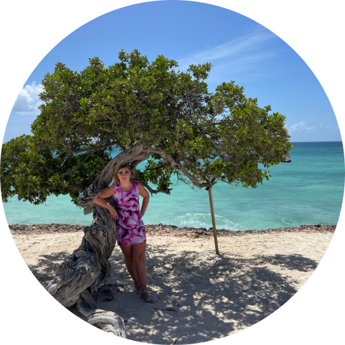 Xanthippe finds some shade under a tree on a beach in the Caribbean